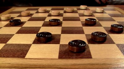 Размен в шашках